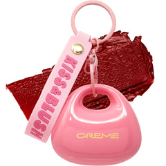 The Crème Shop front packaging showing cherry tint and charm benefit
