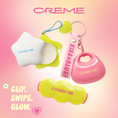 The Crème Shop lifestyle flatlay with accessories showing fashionable, functional lip care