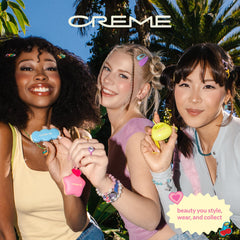 The Crème Shop lip butter on a desk with phone for everyday-carry convenience benefit