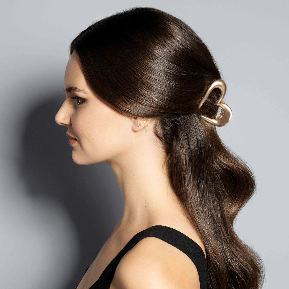 The Hair Edit heart clip side detail highlighting slim profile and secure spring benefit: comfortable wear