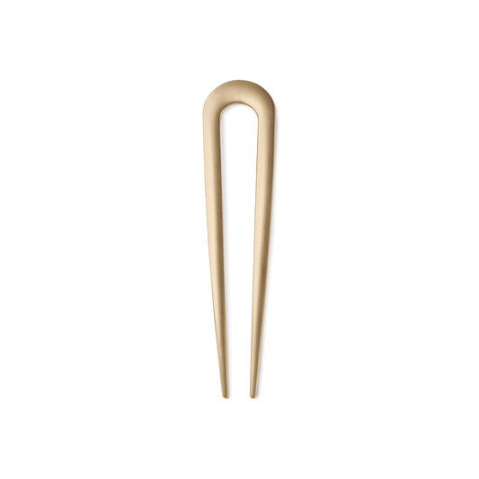 The Hair Edit front view of gold French pin shows sleek elegant finish and styling benefit