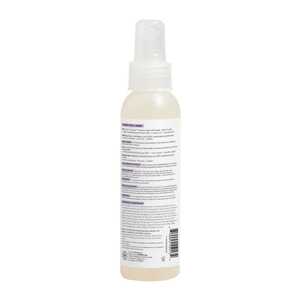 The Honest Company 4 fl oz bottle beside a coin indicating travel-friendly size benefit