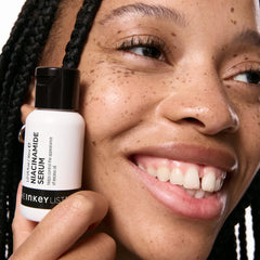 The INKEY List serum placed on bathroom shelf in lifestyle setting inspiring daily use