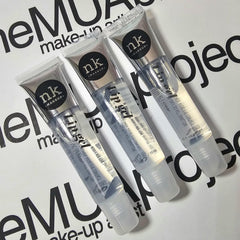 The Make-Up Artist Project gloss in use over lipstick highlighting enhanced shine