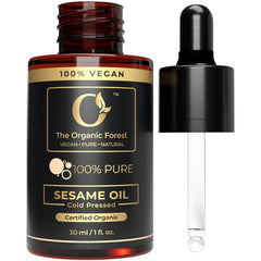 The Organic Forest sesame oil front bottle shows clean organic packaging and purity benefit