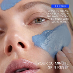 Person rinsing face after The Outset mask illustrating refreshed, hydrated skin