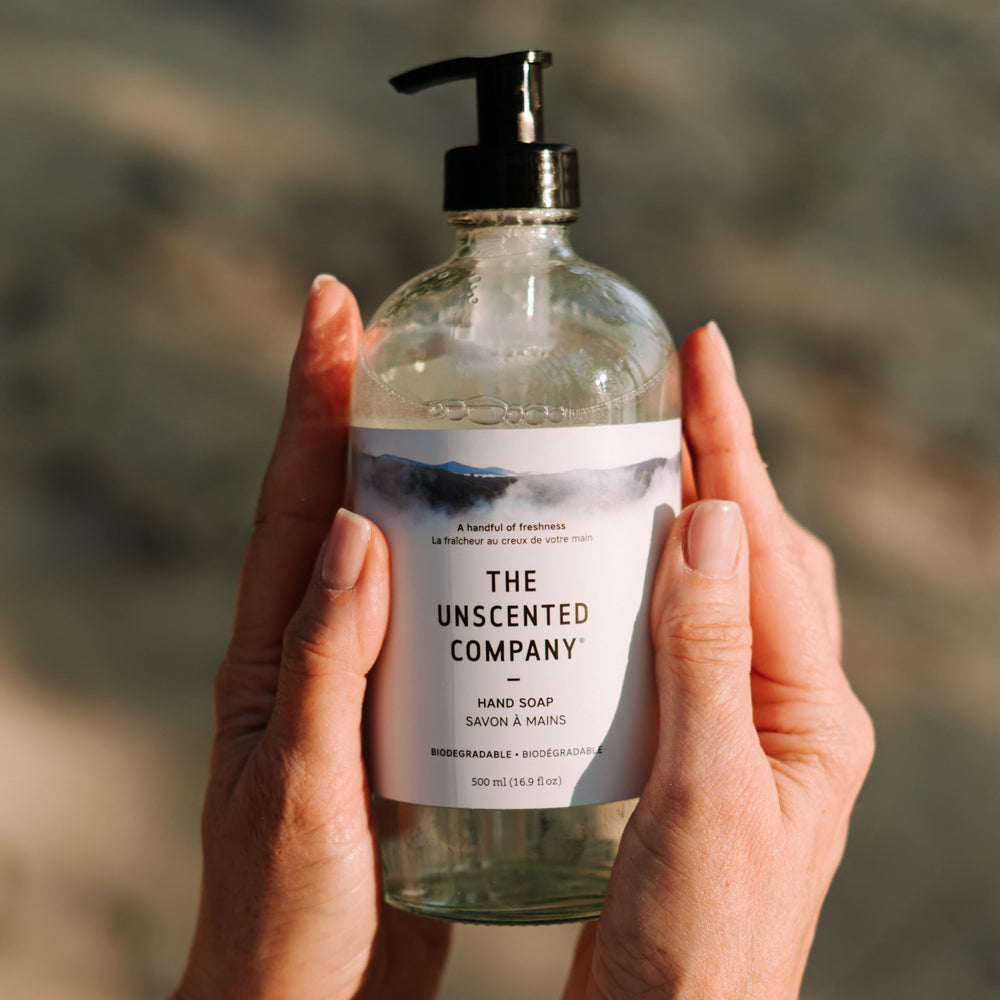 The Unscented Company bottle on a bathroom sink in a lifestyle scene benefit: blends with modern home decor