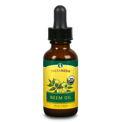 TheraNeem bottle front label showing organic neem oil and benefits
