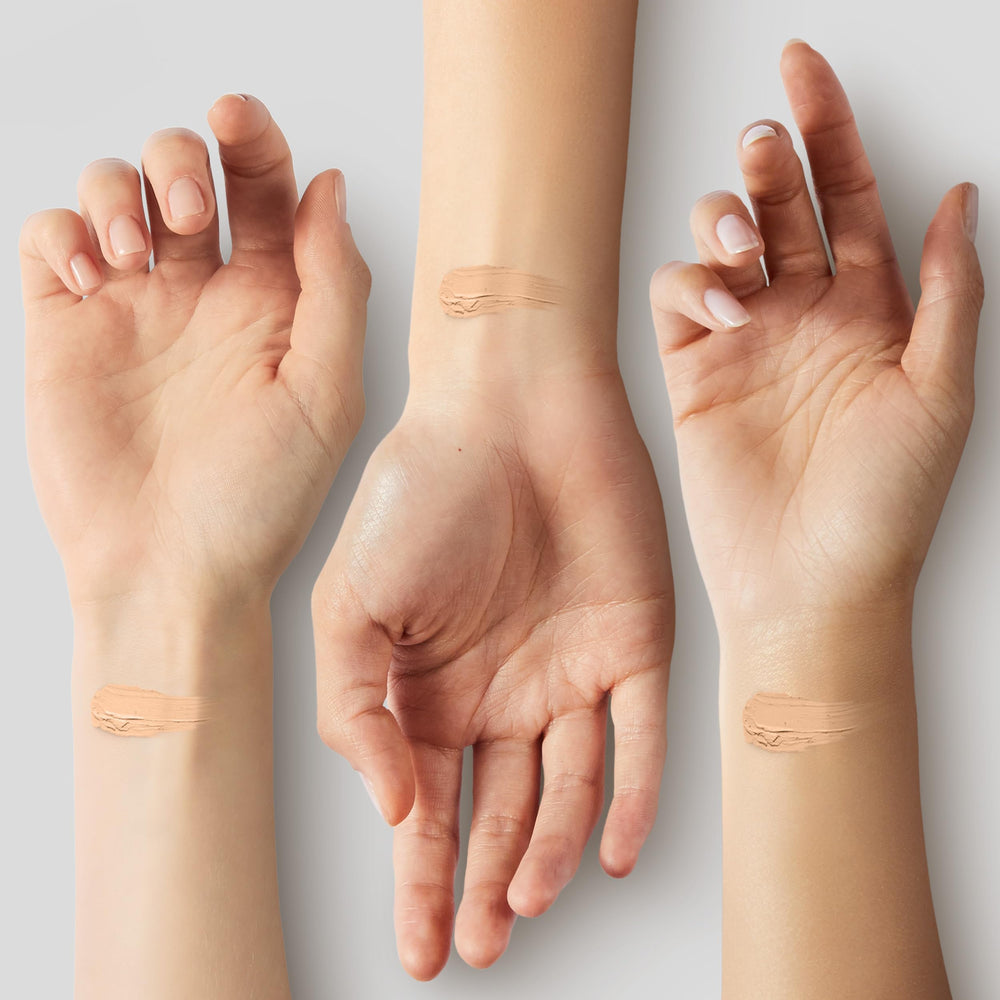 THESAEM concealer pencil held in hand to show portable scale