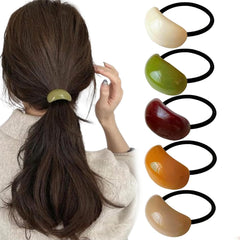 Thinslimer front pack view showing five colorful elastic ponytail holders and neat presentation