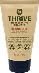 Thrive Natural Care front tube showing SPF50 label and benefit