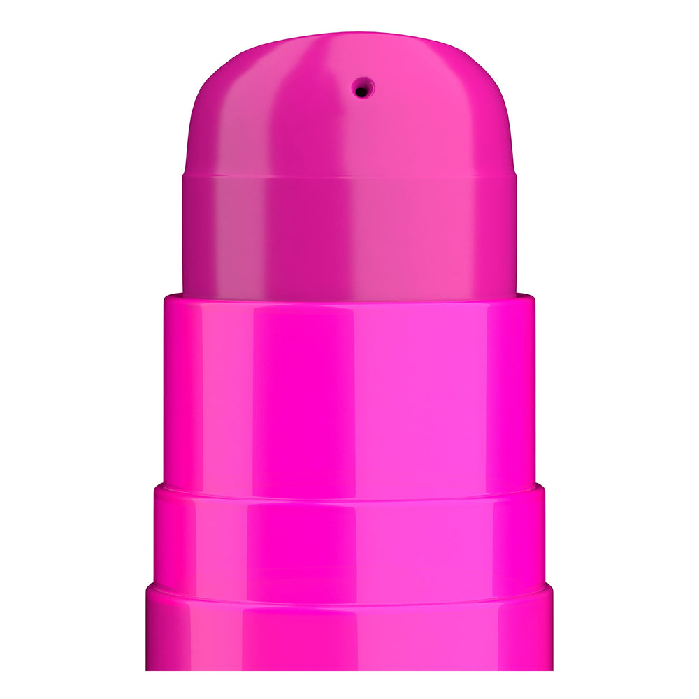 TIGI Bed Head styled hair in mirror portraying salon finish and fragrance appeal