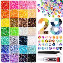 TINKRSTUFF open box with 28 compartments showing mixed-color rhinestones for organized crafting