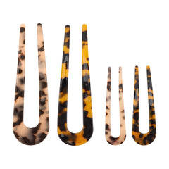 TIOSRU front view of four tortoiseshell hair pins showing classic pattern and elegance