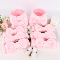 TIOSRU ten pink headbands laid flat demonstrating full bulk set