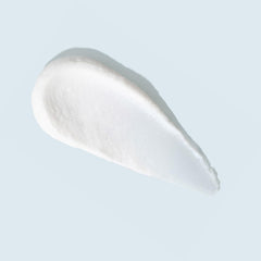 TIZO cream texture close-up showing silky matte finish benefit