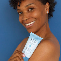 TIZO applied on forearm demonstrating blendable tint and even coverage
