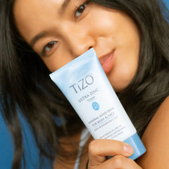 TIZO label close-up highlighting 20% zinc oxide and photostable formula