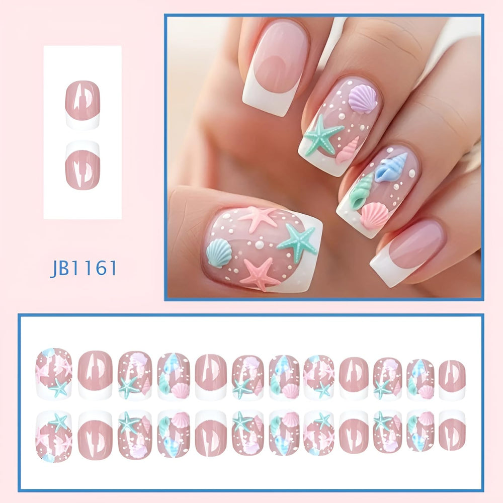 Tnbuokas close-up of French tip and starfish design highlighting summer detail