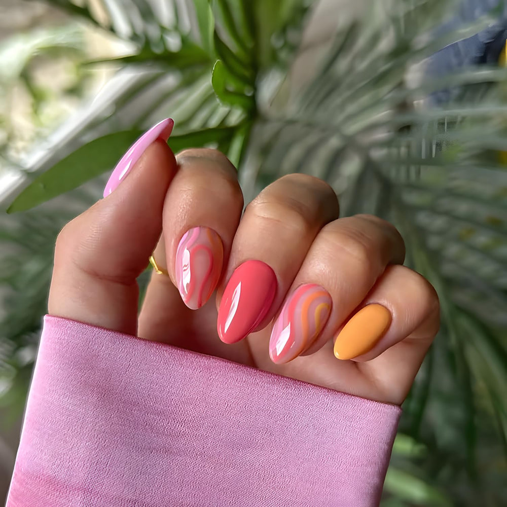 Tnbuokas nails in hand during application demonstrating easy press-on benefit