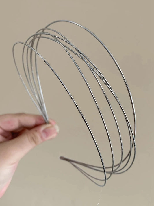 Tobeffect front view of two silver headbands showing clean packaging and modern design