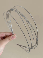 Tobeffect front view of two silver headbands showing clean packaging and modern design