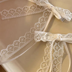 Tobeffect lace bow close-up showing fabric texture and subtle elegance benefit