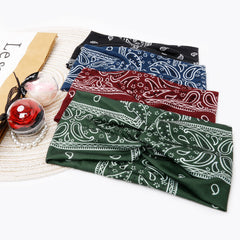 Tobeffect headband next to ruler showing 12-inch stretch and fit