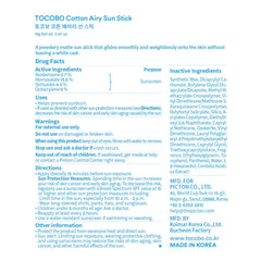 TOCOBO using sun stick at the beach showing lightweight protection outdoors