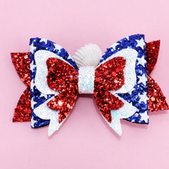 TODDER group of children wearing bows conveys matching patriotic outfit benefit