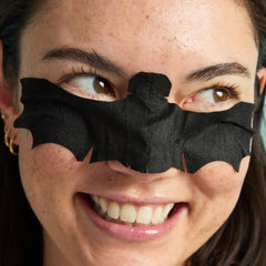 TONYMOLY mask pouch held in hand showing travel-friendly compact size