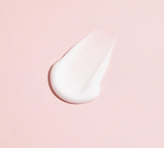 TONYMOLY cream in bathroom setting applied on hand, demonstrates soft plump skin