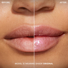 Too Faced gloss held in hand in lifestyle setting showcasing easy portability