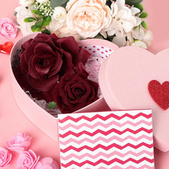 Topbuti large rose pinned to a clutch bag adding decorative flair and versatility