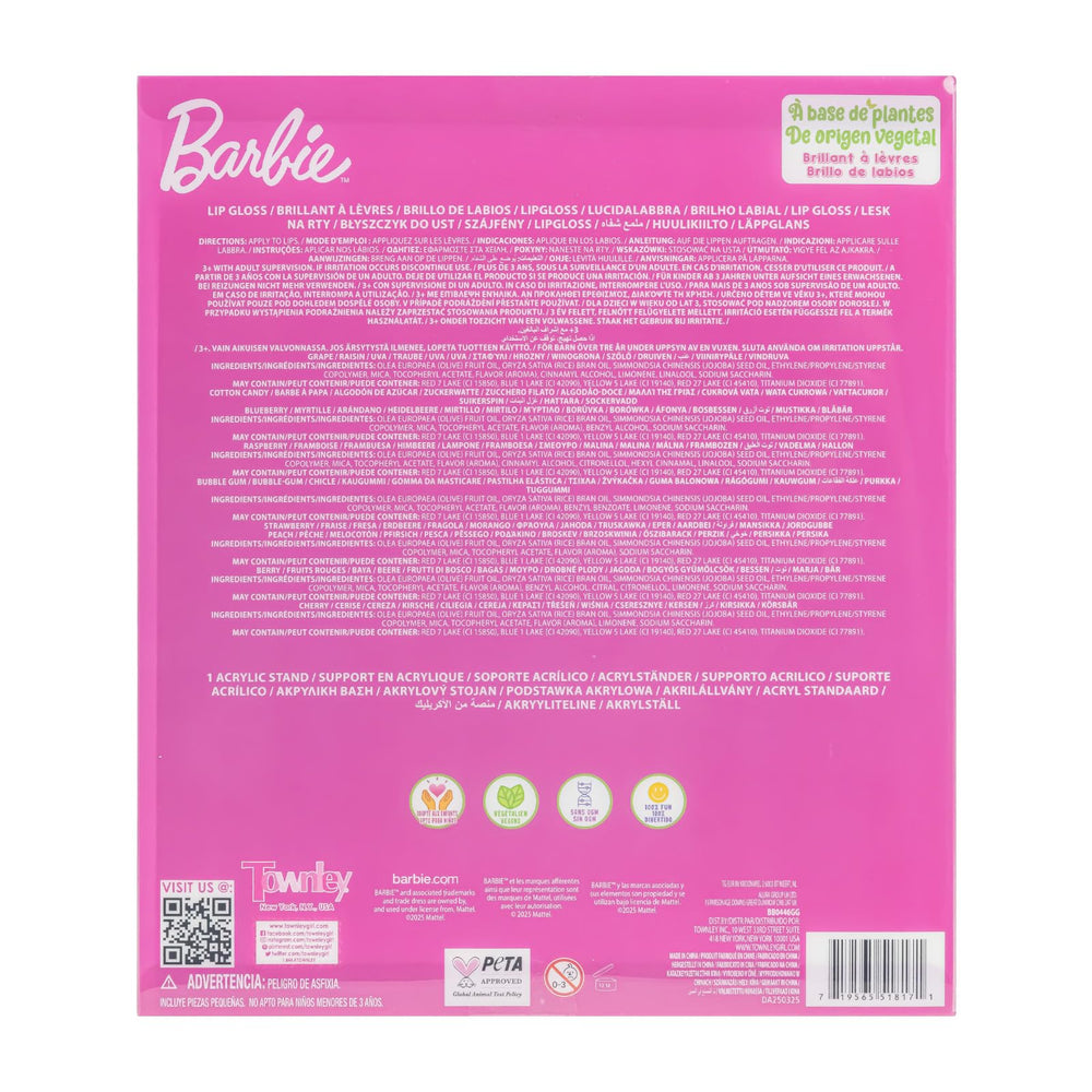 Townley Girl glosses arranged on a bedroom shelf with Barbie stand for display