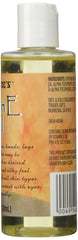 Trader Joe's oil pouring close-up highlighting smooth texture and easy application for soft skin