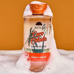 Tree Hut bottle next to hand showing 18 fl oz scale and convenience