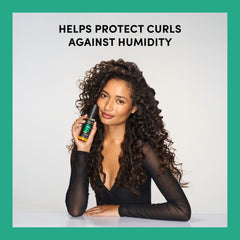 TRESemmé close-up oil droplet texture illustrating smoothing benefits for cuticles