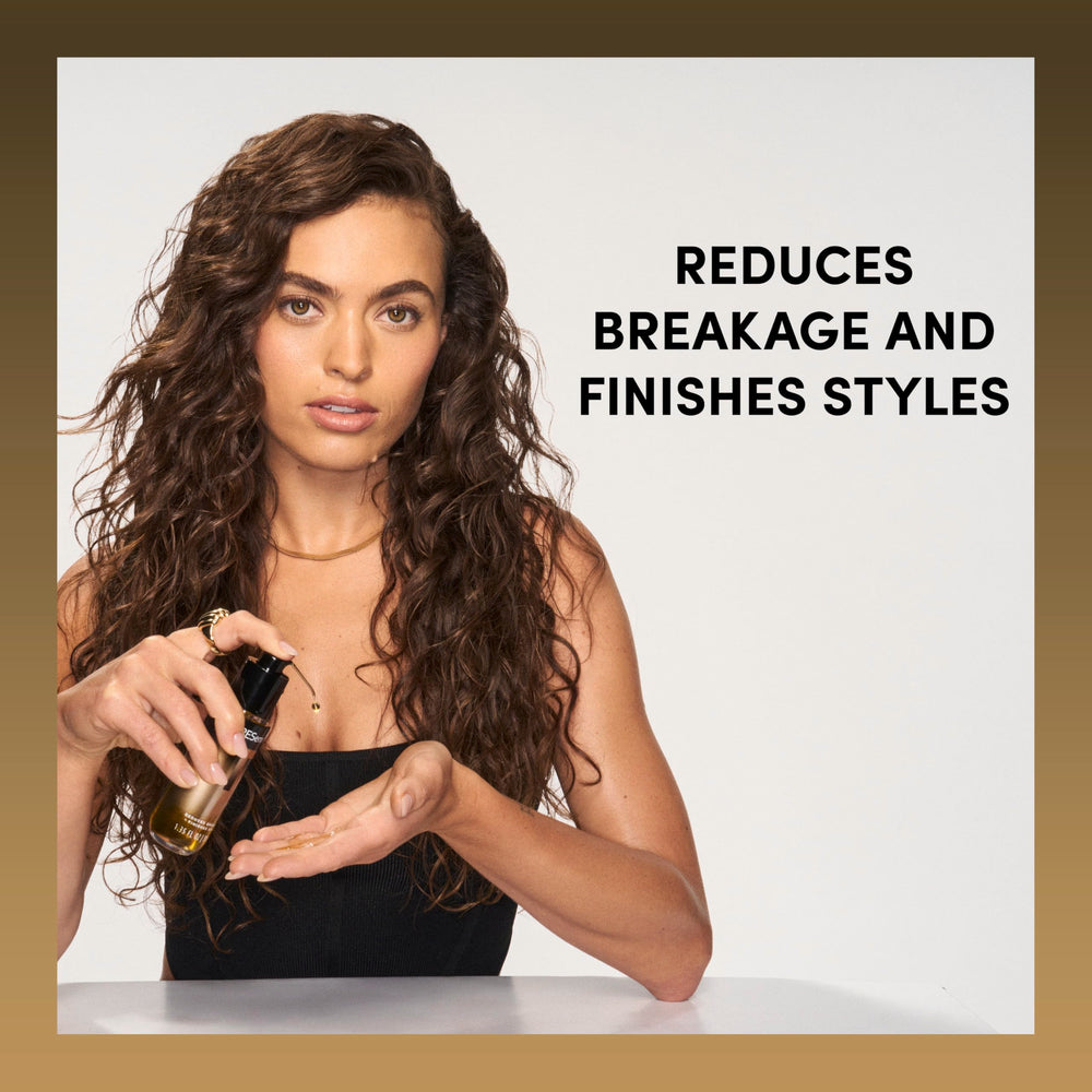 TRESemmé applying oil to damp hair for smoother blow-drying