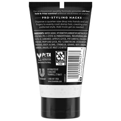 TRESemmé bottle closeup label highlighting extra hold and frizz-control benefit