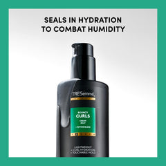 TRESemmé being applied to damp curls for defined, touchable hold