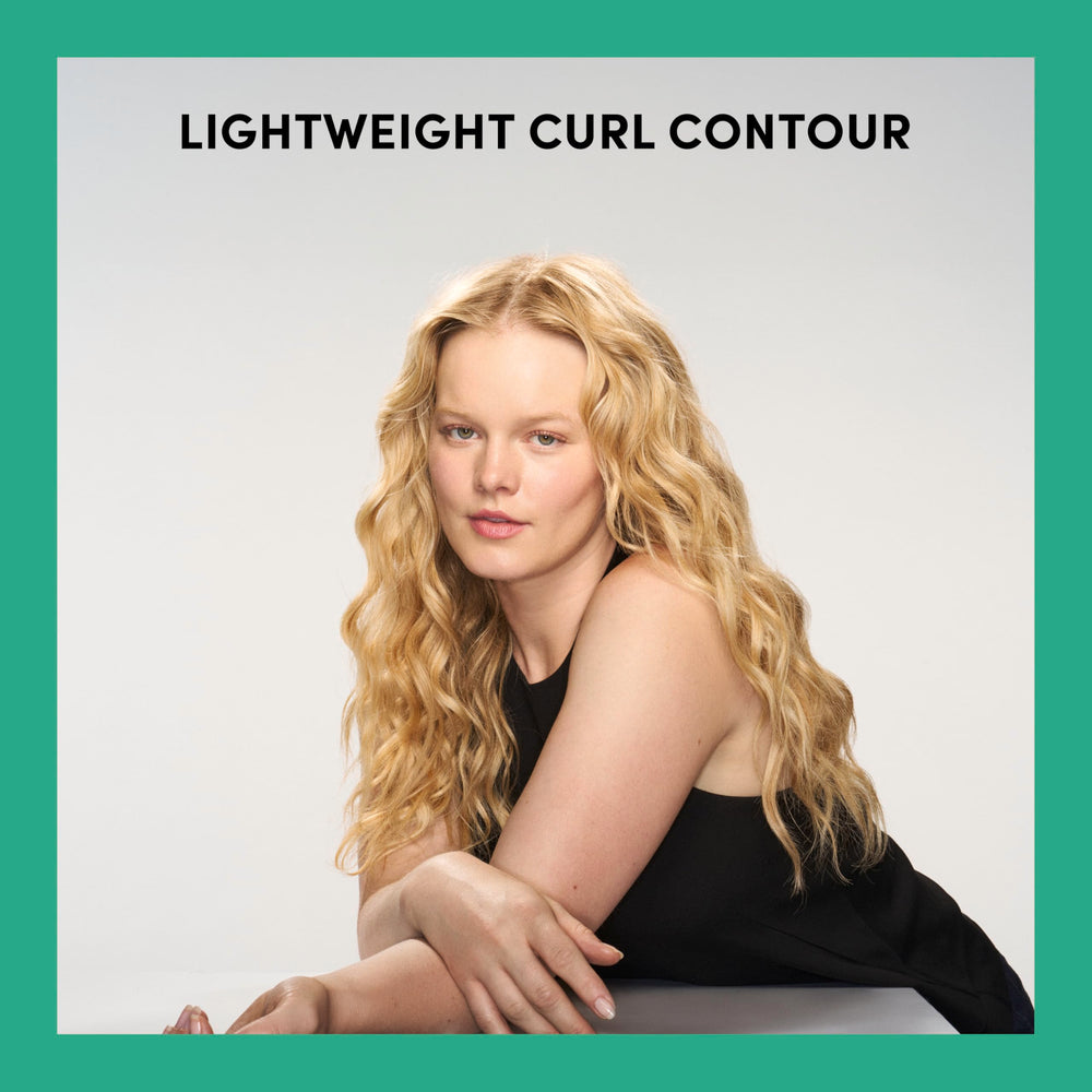 TRESemmé styled curls after diffusing illustrating enhanced volume and bounce
