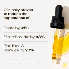 Hand dispensing Trilogy rosehip oil dropper demonstrating precise application and controlled dosage