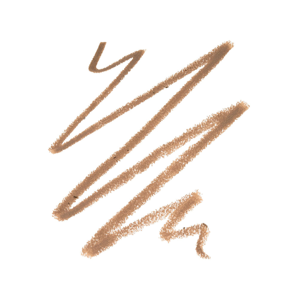 Trish McEvoy brow shaper in use lifestyle image applying pencil for natural, defined brows