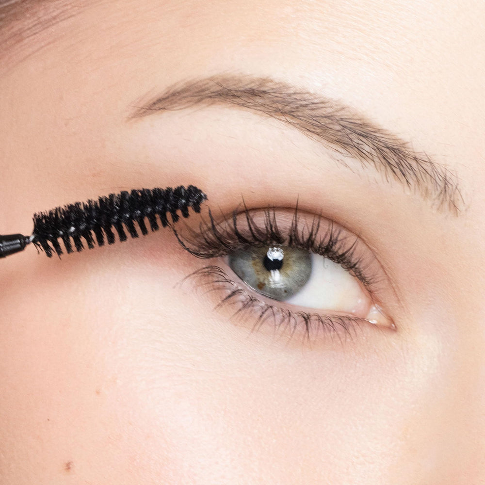 Trish McEvoy mascara applied to lashes during use showing lifted curl and length benefit