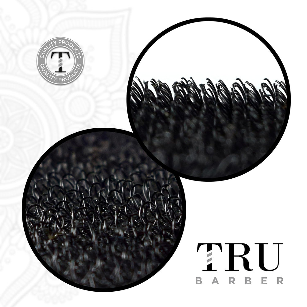 TRU BARBER clip in hand showing compact size and portability