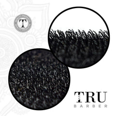 TRU BARBER clip in hand showing compact size and portability