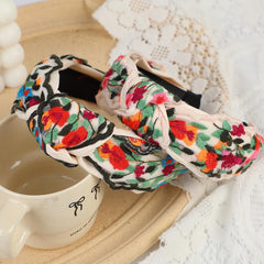 TURTLEDOVE close-up of multicolor embroidery highlights quality stitching