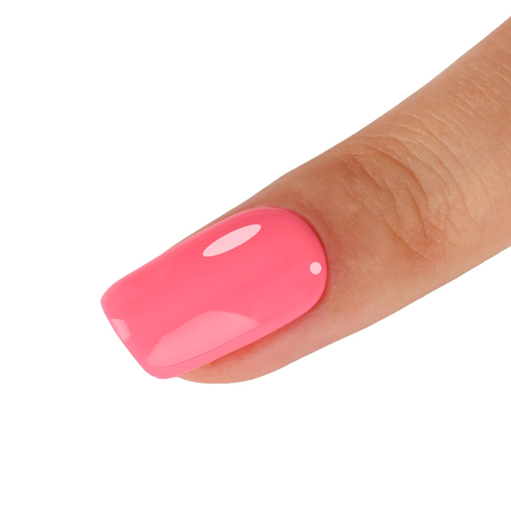 TUTUYU bottle front showing coral-pink shade and glossy benefit
