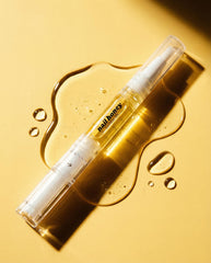 Twinkled T arranged ingredient bottles showcasing organic oil blend benefit